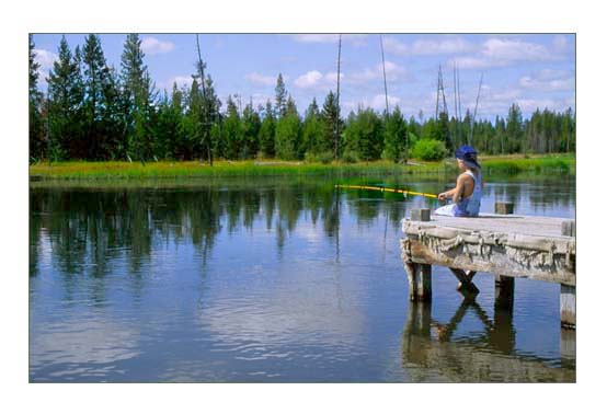 Fly fishing on the Deschutes River nearby Sun River in Central Oregon