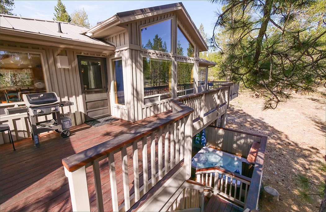 Upper deck with BBQ, dining above private hot tub
