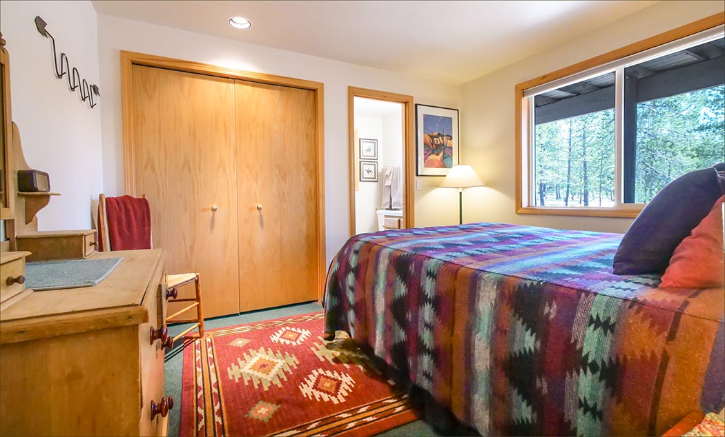 Mt Bachelor master bedroom with king sized bed; ideal family ski home.